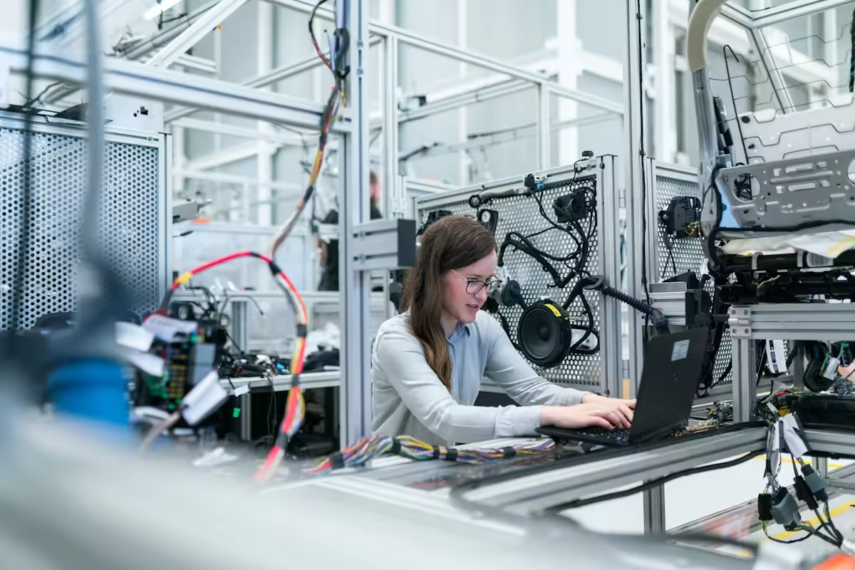 Engineers Inspecting Digital Warehouse Management Systems and Sensor Data