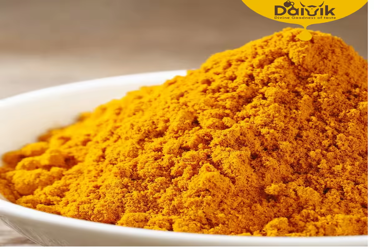 Turmeric powder rich in curcumin content showing vibrant orange-yellow hue